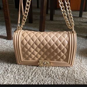 Tan fashionable handbag